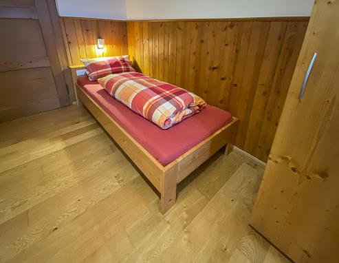 Einzelbett im Zimmer 3 im Haurihäusle Einzelbett im Zimmer 3 im Haurihäusle